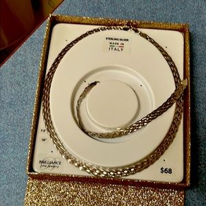 Sterling silver braided necklace and chain.
